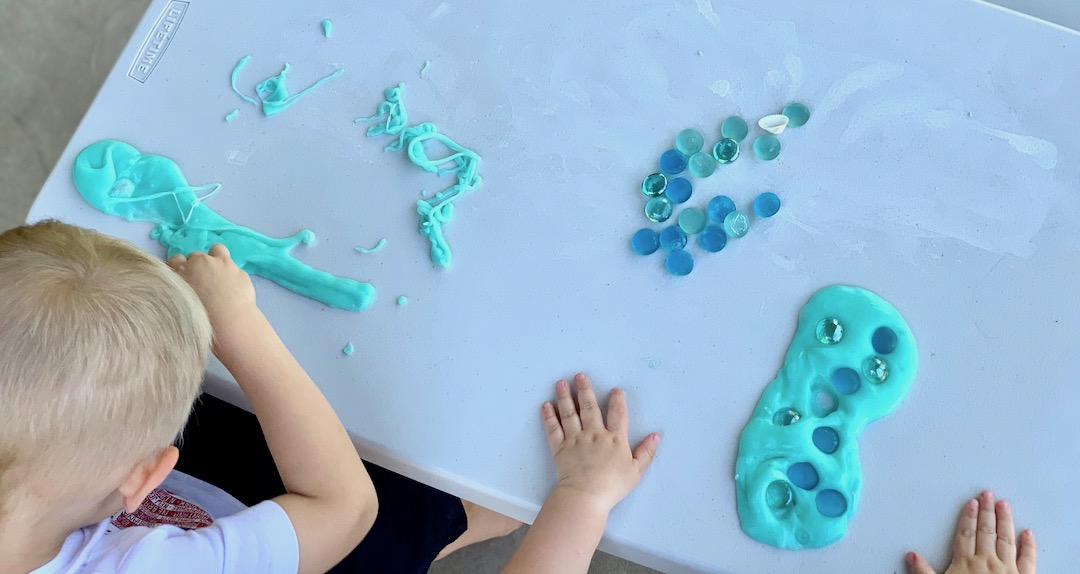 playing with sand slime