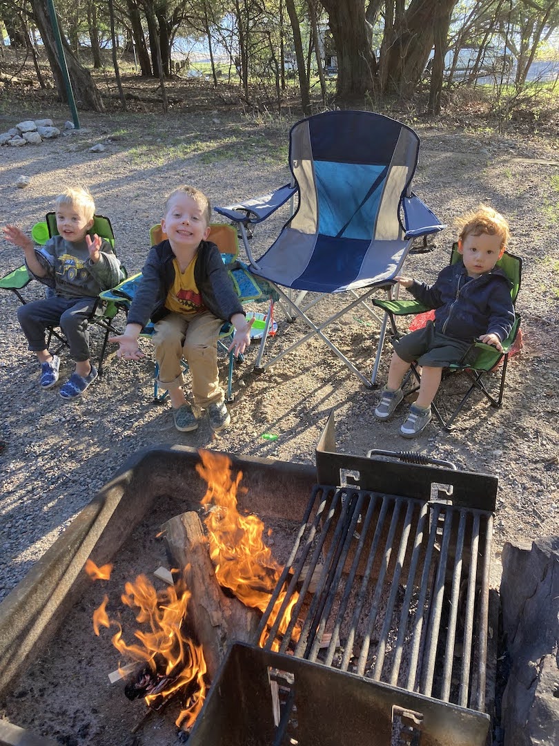 children by a campfire