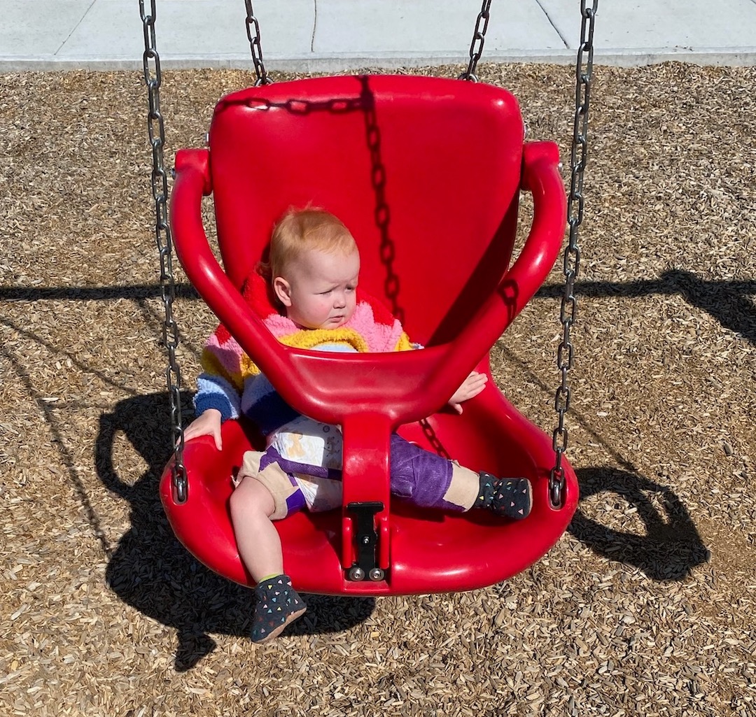 Adaptive swing for a toddler with hip dysplasia