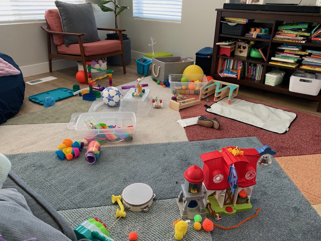 spica cast playroom cluttered with toys for entertainment