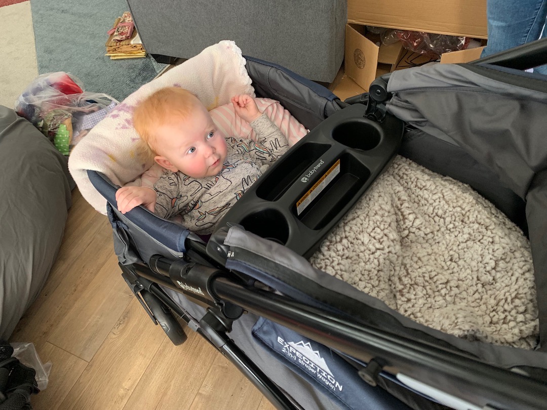 open wagon instead of a stroller for transporting baby in a spica cast